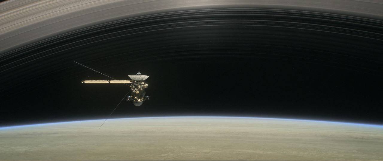 Ілюстрація, як станція&amp;nbsp;«Кассіні» проходить між Сатурном і його внутрішніми кільцями.&amp;nbsp;NASA / JPL-Caltech