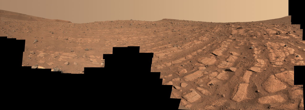 Осадові породи і валуни, які могла принести давня марсіанська річка. Зображення є мозаїкою з великої кількості фото, отриманих марсоходом.&amp;nbsp;NASA / JPL-Caltech / ASU / MSSS